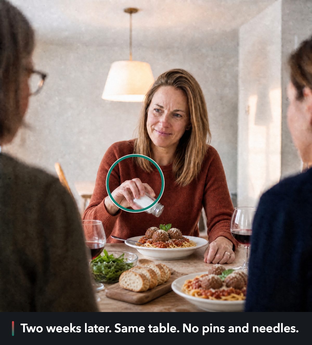The same dinner table two weeks later: the woman smiles and shakes salt onto her pasta